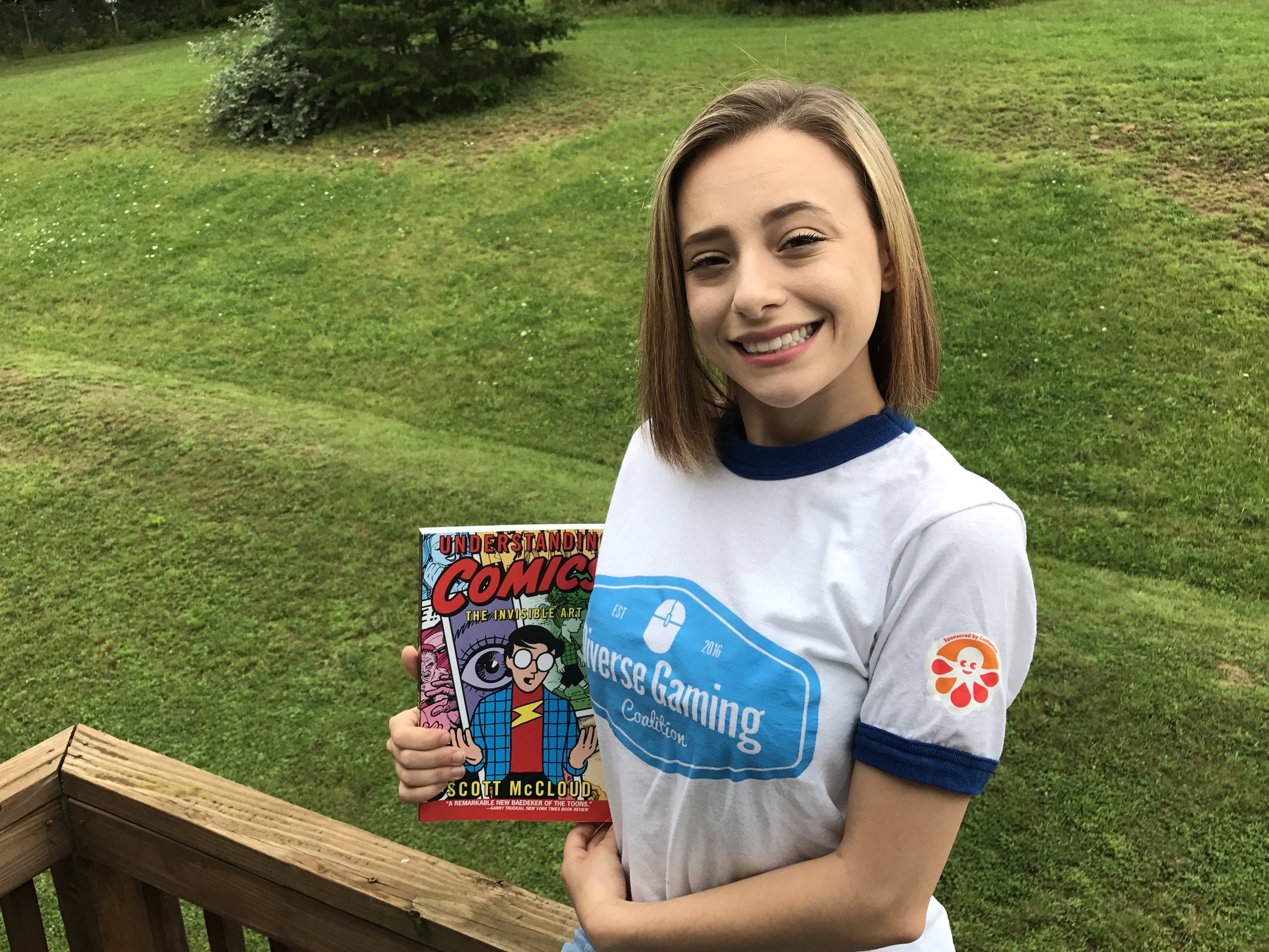 Teen author with her comic book