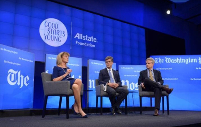 A woman and two men sit on the stage, with the Good Starts Young, Allstate Foundation and Washington post logo behind